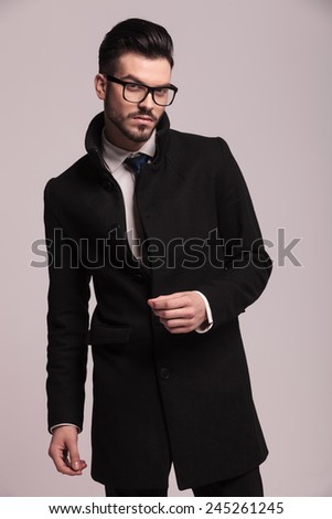 Long Black Coat Stock Images, Royalty-Free Images & Vectors ...