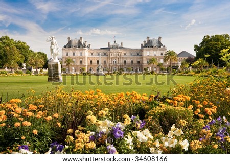 stock-photo-jardin-du-luxembourg-with-the-palace-and-statue-few-flowers-are-in-front-and-blue-sky-behind-34608166.jpg
