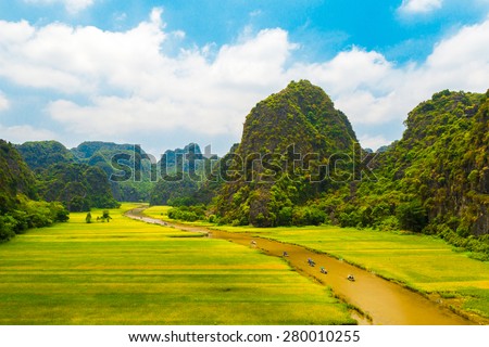 Rice field and river "Ngo Dong" at TamCoc, Ninhbinh, Vietnam; famous for tourism at Vietnam. Ninhbinh city is located in the south than the capital Hanoi, Vietnam.