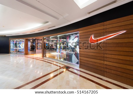 KUALA LUMPUR - SEP. 13, 2016: Nike store in the Suria KLCC mall. Nike, Inc. is an American corporation that manufactures and sells footwear, apparel, equipment, accessories and services worldwide.