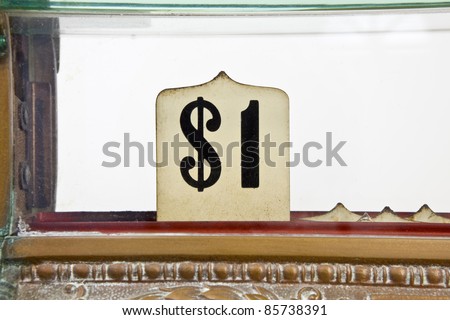 Vintage 1920's cash register pop up dollar sign detail.