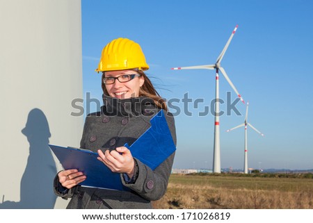 Female Engineer in a Wind Turbines Farm