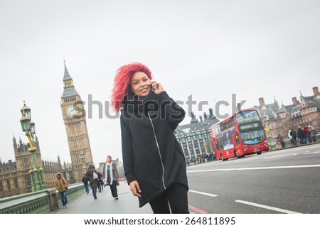 https://thumb7.shutterstock.com/display_pic_with_logo/308011/264811895/stock-photo-beautiful-redhair-woman-talking-on-mobile-in-london-with-big-ben-and-westminster-palace-on-264811895.jpg