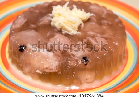 https://thumb7.shutterstock.com/display_pic_with_logo/3117056/1017961384/stock-photo-traditional-russian-meat-jelly-holodets-is-similar-to-english-calves-foot-jelly-and-serbian-1017961384.jpg