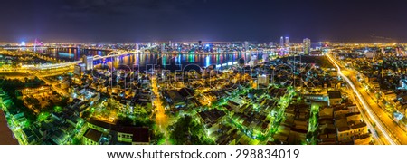 Da Nang city panorama at night with the lights flooded the city, is adorned with light bridges around Da Nang making more night life. This is considered as the best tourist city for foreign visitors