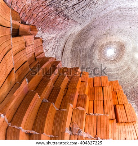 The red brick chimney hole towards very abstract view as seen the rise of brick villages about to disappear due to lack of funding in Vinh Long, Vietnam