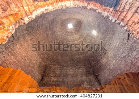 Brickyard be seen from below looks like chimneys giant eye, but expressed abstraction level rise of a meter dying villages in the countryside lack of funding of Vinh Long, Vietnam