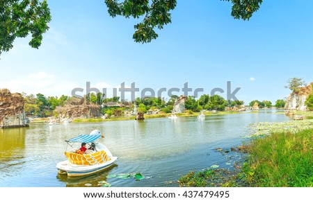 Dong Nai, Vietnam - February 23rd, 2015: The lovers relaxing on a swan boat on lake on sunny spring morning, distance floating boat trip on lake romantic air to welcome spring in Dong Nai, Vietnam