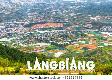 Dalat, Vietnam - August 2nd, 2016: Landscape mount Langbiang, below vegetable gardens, flower farming food supply for the whole region, place of excursions, central highlands near Dalat, Vietnam