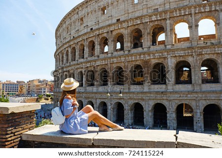 https://thumb7.shutterstock.com/display_pic_with_logo/3120227/724115224/stock-photo-travel-woman-in-romantic-dress-and-hat-sitting-and-looking-on-coliseum-rome-italy-beautiful-724115224.jpg