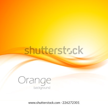Abstract wavy orange background with light effect