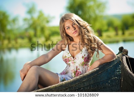 https://thumb7.shutterstock.com/display_pic_with_logo/315760/101828809/stock-photo-happy-female-tourist-having-fun-on-old-boat-summertime-sailing-vacation-beautiful-woman-outdoor-101828809.jpg