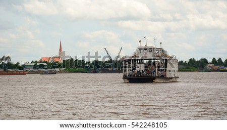 An Giang, Vietnam - Aug 7, 2016. A ferry on the Mekong River in Chau Doc, Vietnam. The Mekong is a trans-boundary river in Southeast Asia. It is the world's 12th-longest river.
