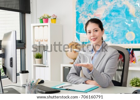 Attractive Beauty Business Worker Woman Working On Travel Agent Company Support All Customer And Holding Airplane Attractive Beauty Business Worker Woman Working On Travel Agent Company Support All Customer And Holding Airplane