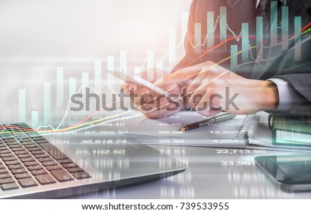 Double exposure businessman and stock market or forex graph suitable for financial investment concept. Economy trends background for business idea and all art work design. Abstract finance background.