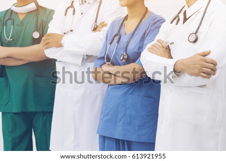 Medical people - doctors, nurse and surgeon.