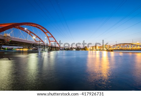 Dusk over Binh Loi Bridge new and old by night, Ho Chi Minh City, Vietnam