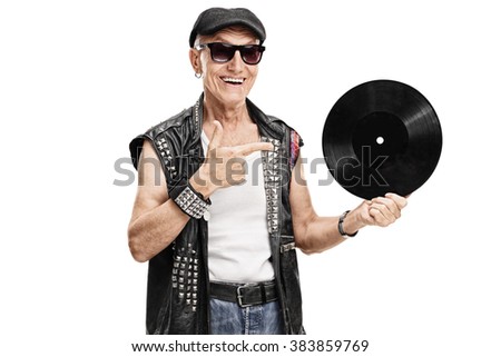 stock-photo-senior-punk-rocker-holding-a-vinyl-and-pointing-to-it-with-his-finger-isolated-on-white-background-383859769.jpg