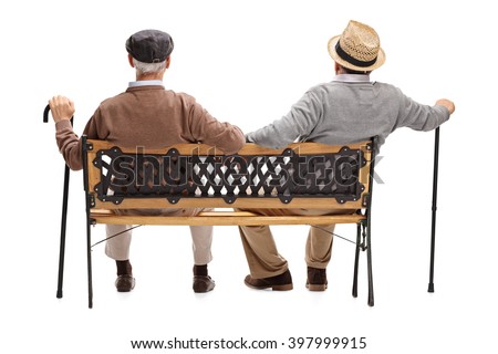 stock photo rear view studio shot of two relaxed senior gentlemen sitting on a wooden bench isolated on white 397999915