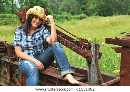 Country Girl Sitting On Farm Equipmentsouthern Stock Photo 61131082 ...