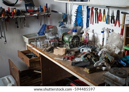 Messy Workshop Complete Chaos On Workbench Stock Photo