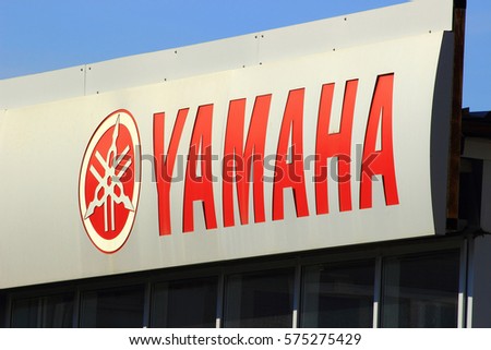 Samara, Russia - August 30, 2016. sign close-up with the emblem and inscription on YAMAHA service center