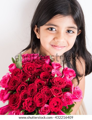 https://thumb7.shutterstock.com/display_pic_with_logo/3471602/432216409/stock-photo-indian-little-girl-holding-bouquet-or-red-rose-flowers-asian-girl-with-flowers-little-indian-girl-432216409.jpg