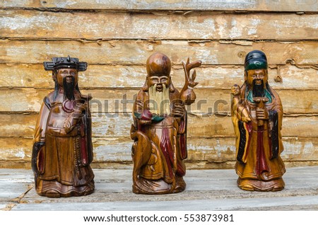 Wood Statue of Chinese Gods, of Fortune (Fu,Hok), of Prosperity (Lu,Lok), and of Longevity (Shou,Siu), Select Focus.