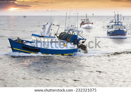 Tired fisherman homewards at the end of a hard day in France