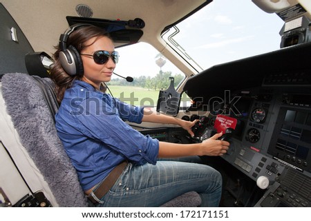 https://thumb7.shutterstock.com/display_pic_with_logo/351946/172171151/stock-photo-the-young-beautifu-women-is-a-pilot-the-small-plane-172171151.jpg