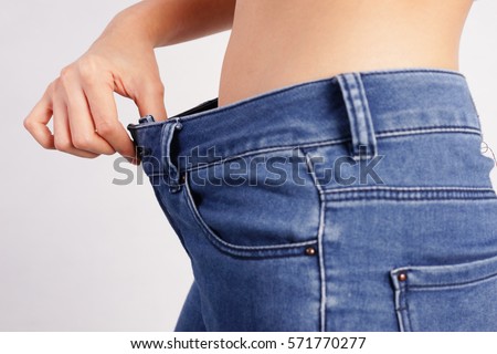 Woman Showing Loose Jeans Loss Weight Stock Photo (Royalty Free ...