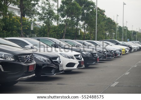Bangkok, Thailand, January 6, 2017: Closeup of new luxury cars Mercedes-Benz c and e Volvo class parking in front of car store. Detail front view of cars.