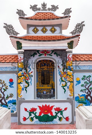 Vietnam Quang Binh Province: Shrine as altar on family grave plot in cemetery.