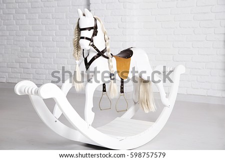 photo of children's horse swing