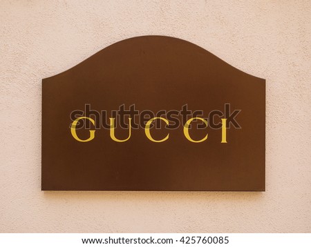 LA ROCA VILLAGE, BARCELONA, CATALONIA, SPAIN - MAY 2016 : silkscreen poster with the Gucci logo, brand outside the official store