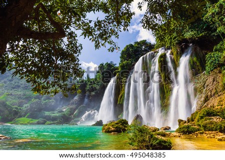 Ban Gioc waterfall in Cao Bang, Viet Nam - The waterfalls are located in an area of mature karst formations were the original limestone bedrock layers are being eroded