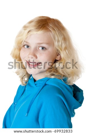 Young beautiful girl / child smiles happy into camera. Isolated on white background.
