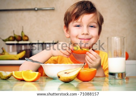 Child Fruit Stock Images, Royalty-Free Images & Vectors 