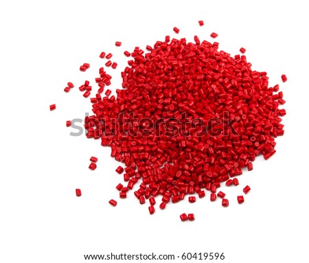 Pile of red plastic granules isolated on white