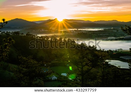 DA LAT, VIETNAM, May 30, 2016: Pine forest with colorful cloud, Da Lat is highland city fog in the morning. Da Lat is one of the beautiful city in Viet Nam.