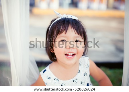 Asian girl with really large teeth Britney spears bikini clad top 10