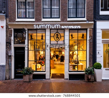 Exterior Of A Small Womens Fashion Boutique With Manekins Exterior Of A Small Womens Fashion Boutique With Manekins