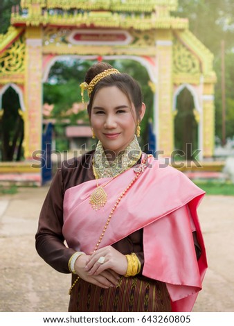 https://thumb7.shutterstock.com/display_pic_with_logo/3996973/643260805/stock-photo-thai-costume-beautiful-women-costume-lao-style-in-thailand-thai-costume-beautiful-thai-girl-in-643260805.jpg