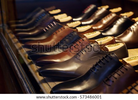 Men's fashion leather shoes on a shop window