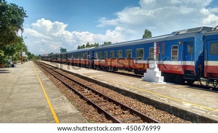 Editorial: Quang Ngai, Vietnam, 7th June 2016. Train of the 'State Railway of Vietnam' parked on tracks at the train station.
