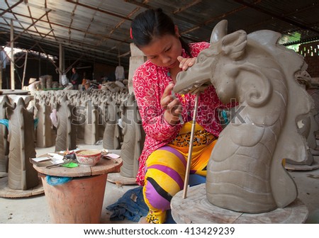 Vinh Long, Vietnam, September 27, 2015 the woman, traditional pottery, rural Vinh Long, Vietnam