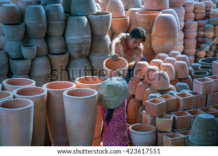 Vinh Long, Vietnam, April 14, 2016 workers, traditional pottery, Vinh Long province, Vietnam