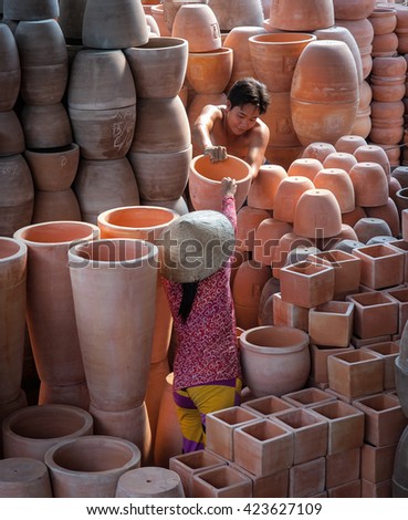 Vinh Long, Vietnam, April 14, 2016 workers, traditional pottery, Vinh Long province, Vietnam