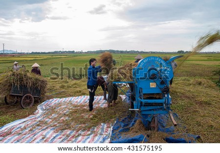 BAC Ninh, Vietnam, May 4, 2016 FG Bac Ninh, rice harvesting, threshing machines, in fields