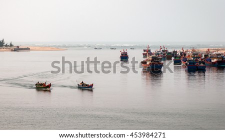QUANG BINH, Vietnam, July 12, 2016 Fishing boats, estuary Nhat Le, Quang Binh waters, Vietnam